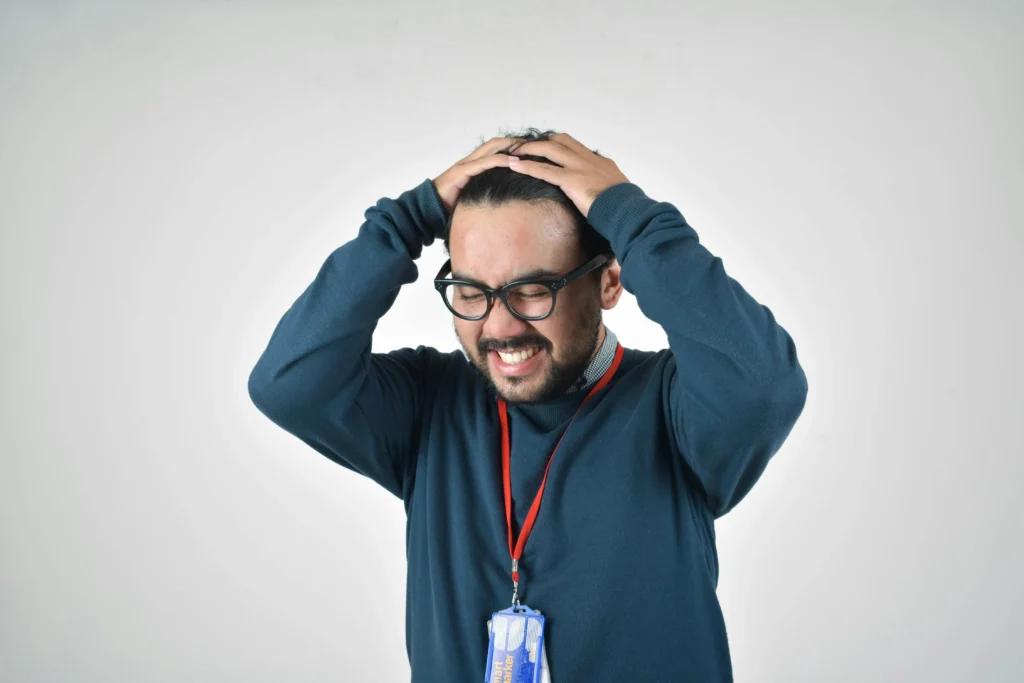 digital marketing mistakes 2025 frustrated marketer holding his head