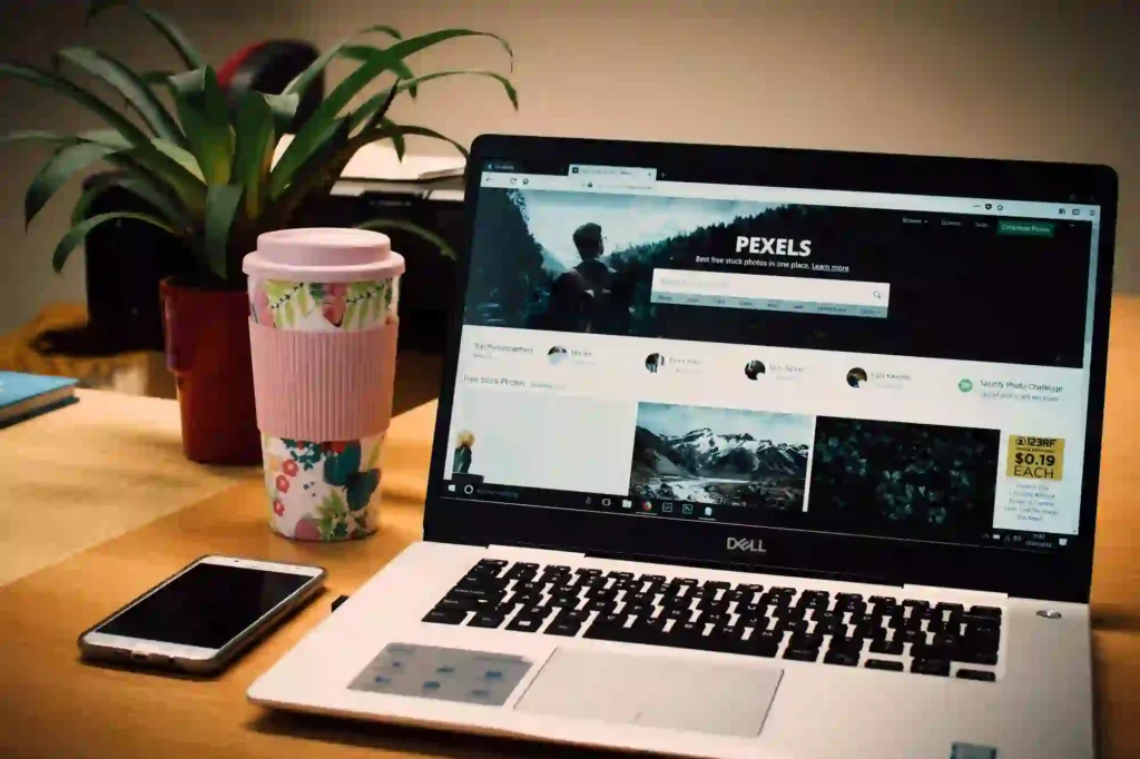 UK business owner reviewing SEO traffic and revenue performance on analytics dashboard